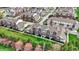 Aerial view of neighborhood featuring beautiful homes with well-manicured lawns and lush trees at 12658 Watford Way, Fishers, IN 46037