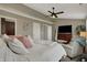 Bright main bedroom with vaulted ceilings, neutral colors, and seating area at 12658 Watford Way, Fishers, IN 46037