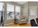 Cozy sitting area features comfortable seating and lots of natural light at 12658 Watford Way, Fishers, IN 46037