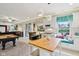 Basement kitchen is connected to the entertainment space, pool, and seating area at 13974 Nina Dr, Carmel, IN 46074