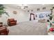 Spacious basement with plenty of room for activities, a stage, and a seating area at 13974 Nina Dr, Carmel, IN 46074