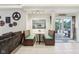 Cozy dining area with booth seating and a modern mirror, located in the finished basement at 13974 Nina Dr, Carmel, IN 46074