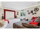 Large finished basement living room with an oversized couch and custom theater decor at 13974 Nina Dr, Carmel, IN 46074