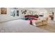 Finished basement living room with a movie theme and lounge seating, plus a game area at 13974 Nina Dr, Carmel, IN 46074