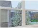 Exterior view of neighborhood houses framed by a window at 13974 Nina Dr, Carmel, IN 46074