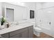 Well-lit bathroom with gray vanity, quartz countertop, and a shower-tub combination with tile surround at 141 Creststone Blvd, Westfield, IN 46074