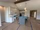 Open kitchen with a large island, stainless appliances and modern white cabinetry at 141 Creststone Blvd, Westfield, IN 46074