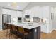 Modern kitchen with a spacious island, stainless steel appliances, and open layout at 141 Creststone Blvd, Westfield, IN 46074