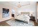 Elegant main bedroom features a tray ceiling, soft lighting, and coordinated furnishings for relaxation at 141 Creststone Blvd, Westfield, IN 46074