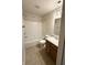 Bathroom with single sink vanity, tile floor, and bath-shower combination at 14243 Clapboard Dr, Noblesville, IN 46060