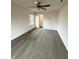 Inviting bedroom with carpet, a ceiling fan, a window, and an open doorway to a hallway at 14243 Clapboard Dr, Noblesville, IN 46060