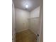 A compact closet space with neutral walls, tile flooring, and a single wire shelf for optimized storage at 14243 Clapboard Dr, Noblesville, IN 46060