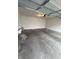 An empty garage with concrete flooring; great for parking vehicles or additional storage at 14243 Clapboard Dr, Noblesville, IN 46060