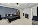 Spacious primary bedroom featuring ensuite bathroom and stairs to another level at 146 Handley St, Indianapolis, IN 46222