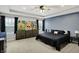 Spacious primary bedroom with recessed lights, ceiling fan and large windows at 146 Handley St, Indianapolis, IN 46222