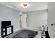 Comfortable bedroom with TV and two windows that let in an abundance of light at 146 Handley St, Indianapolis, IN 46222