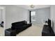 Bedroom with a couch, media center, and soft natural light at 146 Handley St, Indianapolis, IN 46222