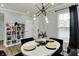 Bright dining area with modern lighting and unique decor at 146 Handley St, Indianapolis, IN 46222