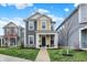 Charming two-story home featuring a covered front porch, sidewalk, and well-manicured lawn at 146 Handley St, Indianapolis, IN 46222