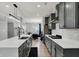 Stylish kitchen with a large island, stainless steel appliances, and gray cabinetry at 146 Handley St, Indianapolis, IN 46222