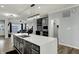 Contemporary kitchen featuring an oversized island, modern light fixture and stainless steel appliances at 146 Handley St, Indianapolis, IN 46222