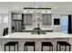 Modern kitchen featuring stainless steel appliances, large island, and contemporary lighting at 146 Handley St, Indianapolis, IN 46222