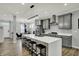 Spacious kitchen with quartz countertops, stainless steel appliances, and modern lighting at 146 Handley St, Indianapolis, IN 46222