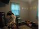 Bedroom with a window, and decor at 150 E Carlisle St, Mooresville, IN 46158