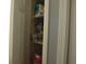 A well-organized closet maximizes storage space with multiple shelves at 150 E Carlisle St, Mooresville, IN 46158