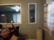 View of a portion of the living room and the entry door at 150 E Carlisle St, Mooresville, IN 46158