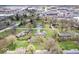Wide aerial shot of the property, highlighting its proximity to local shopping at 1520 E 87Th St, Indianapolis, IN 46240