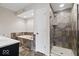 This stylish bathroom boasts a glass enclosed shower, soaking tub and updated fixtures at 1520 E 87Th St, Indianapolis, IN 46240