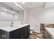 This modern bathroom features double sinks, soaking tub and neutral design at 1520 E 87Th St, Indianapolis, IN 46240