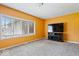 Inviting living room with large windows and tv at 1520 E 87Th St, Indianapolis, IN 46240