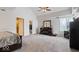 Main bedroom featuring neutral walls, carpet, and furnishings at 1520 E 87Th St, Indianapolis, IN 46240