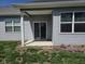 Covered patio featuring a sliding glass door entrance to the home's living space at 1615 Capra Ct, Beech Grove, IN 46107