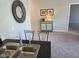 Galley kitchen featuring stainless steel sink, granite countertops, and gray painted walls at 1615 Capra Ct, Beech Grove, IN 46107
