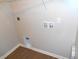 A functional laundry room, with hook-ups for washer and dryer at 1615 Capra Ct, Beech Grove, IN 46107