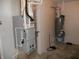 A utility room features a water heater and an air handler at 1615 Capra Ct, Beech Grove, IN 46107