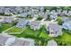 Beautiful aerial view of a residential neighborhood with well-manicured lawns and mature trees at 16491 Wheatley Ct, Fishers, IN 46040