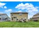 The back exterior features a well-maintained yard and deck perfect for relaxing or entertaining at 16491 Wheatley Ct, Fishers, IN 46040