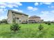 Backyard featuring a well-manicured lawn and wooden deck, providing an ideal outdoor living space at 16491 Wheatley Ct, Fishers, IN 46040