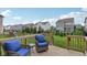 Cozy backyard deck featuring comfortable seating, providing an ideal space for relaxation at 16491 Wheatley Ct, Fishers, IN 46040