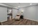 Inviting finished basement area with modern flooring, neutral walls and a comfortable chaise lounge at 16491 Wheatley Ct, Fishers, IN 46040