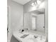 Bathroom with a sink, mirror and a glimpse into other rooms at 16491 Wheatley Ct, Fishers, IN 46040