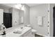 Bright bathroom featuring a vanity with a sink, a toilet, and a towel rack at 16491 Wheatley Ct, Fishers, IN 46040