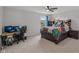 Spacious bedroom with a bed, desk, and large window that allows plenty of natural light at 16491 Wheatley Ct, Fishers, IN 46040