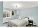 Bedroom with minimalist decor, window, and neutral colors, creating a serene and inviting space at 16491 Wheatley Ct, Fishers, IN 46040