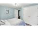 Bedroom featuring a comfortable bed, large closet, and neutral colors, creating a relaxing and inviting space at 16491 Wheatley Ct, Fishers, IN 46040