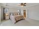 Spacious main bedroom featuring a tray ceiling, walk in shower, and lots of natural light at 16491 Wheatley Ct, Fishers, IN 46040
